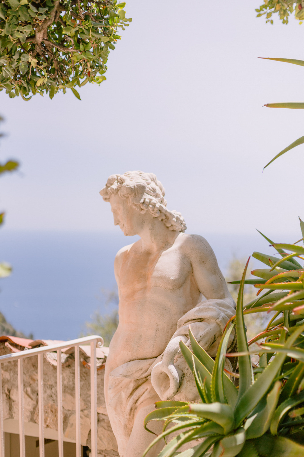 Statues hidden amoung the gardens at the Chateau de la Chevre d'Or Eze